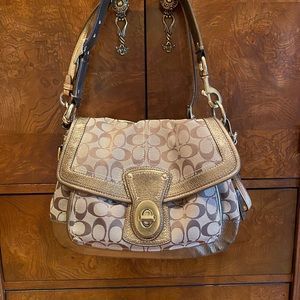 Coach shoulder bag and matching wallet.
